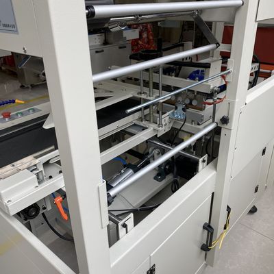 Πλήρως αυτόματη μηχανή τυλίγματος θερμικής ταινίας και σήραγγα συρρίκνωσης για συσκευασία περιβλήματος