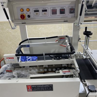 Πλήρως αυτόματη μηχανή τυλίγματος θερμικής ταινίας και σήραγγα συρρίκνωσης για συσκευασία περιβλήματος