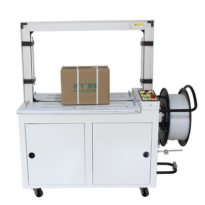 Συσκευή δέσμευσης 150 KG Δυνατότητα MH101 Low Table Packer Strapping Machine με μεταγωγική γραμμή